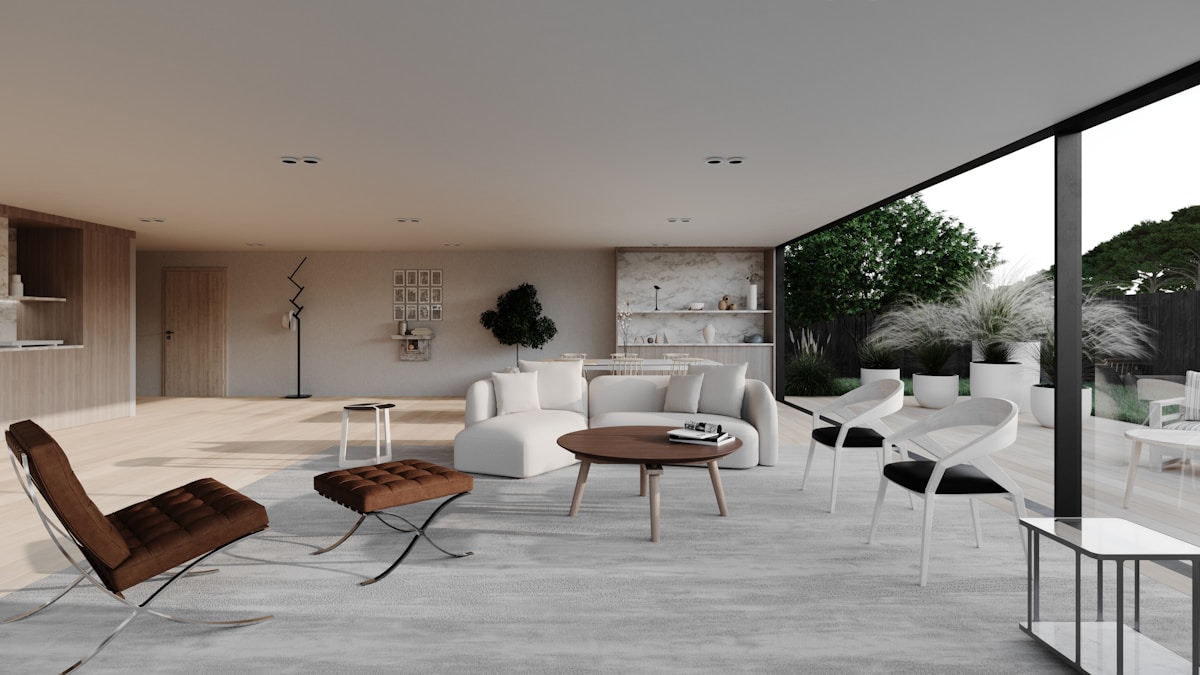 Salon moderne et lumineux avec mobilier design et vue sur le jardin.