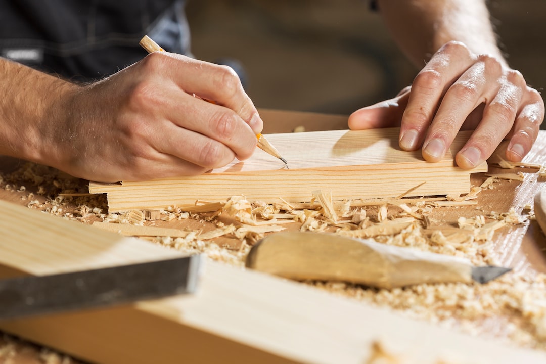 agencement professionnel sur mesure - A professional custom woodwork installation in a modern Swiss commercial space, showing