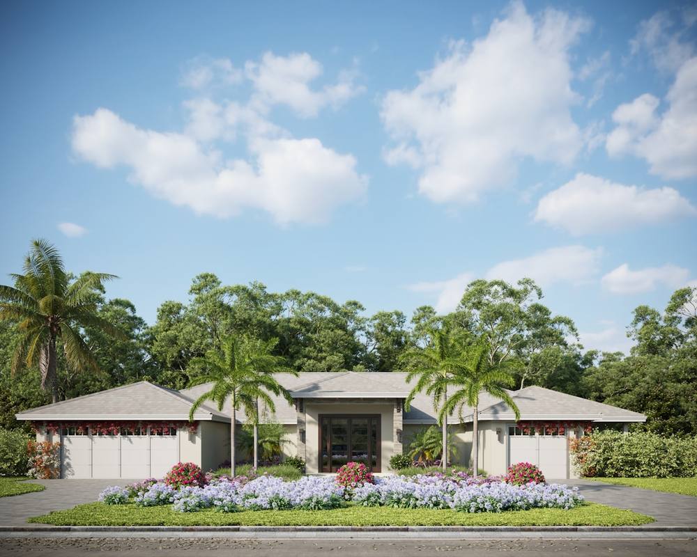Maison de style tropical avec jardin fleuri et palmiers.